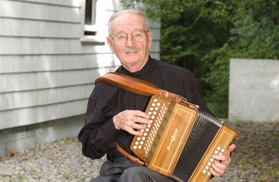 Joe Derrane outside his home, Musician, 2006; Joe Derrane (b. 1930); Randolph, Massachusetts; Photography by Tom Pich