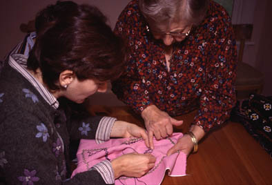 Nairi Havan learning Marash embroidery from Anahid Kazazian, Armenian Marash embroidery, 2002; Lexington, Massachusetts;