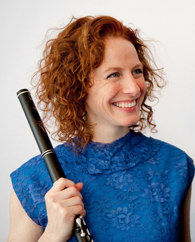 Shannon Heaton holding flute., Irish flute and tin whistle player, 2016; Shannon Heaton; Medford, Massachusetts;
